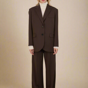 Oversized single-breasted blazer that comes with matching trousers to make a chic and relaxed looking professional women's suit for the office or events.