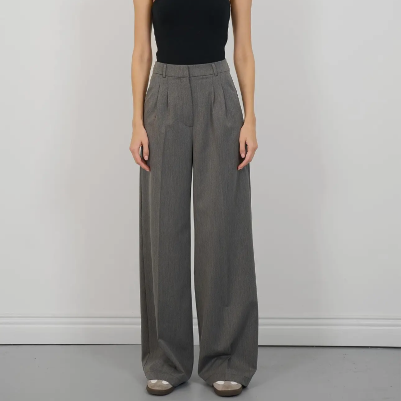 pleated-front trousers that's part of a relaxed-fit suit ensemble thats trendy, professional and comfortable to wear all day or night.