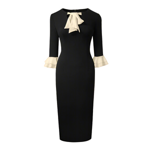 Elegant black office sheath dress with cream bow tie at the neck and matching flared sleeve cuffs, fitted silhouette for work or evening wear.