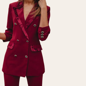 Cherry red tuxedo-style suit with velvet pining and jewel button design