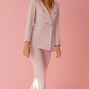 Collarless blush blazer with gold medallion buttons. Chic and stylish blazer pant suit in classic cut