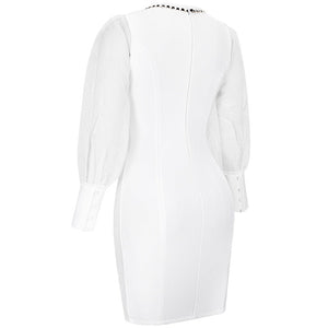 Plus size curvy fashion white bandage dress with mesh sleeves and gold trim and button details. Shapes your curves for a flattering and comfortable fit for any cocktail event, wedding rehearsal, or date night. 